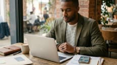 A business owner deciding between a business credit card or business loan.