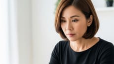 A woman learning about cash value life insurance.