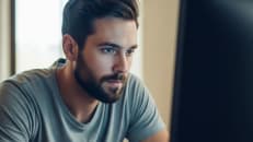 A man learning about debt relief programs.