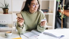 A young woman learning about building her credit history. 