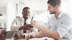 A man learning how business loans work. 