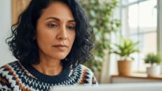 A woman learning how life insurance could help pay for funeral expenses.