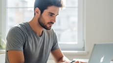 A man learning about his income-to-debt-ratio.