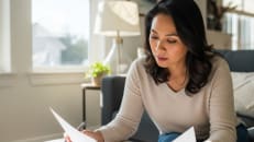 A woman learning more about mortgage points. 