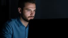 A man learning about the pros and cons of living benefits life insurance.