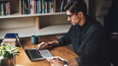 A remote worker learning about tax deductions and claiming expenses working from home.