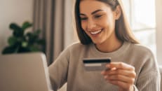 A woman making the most of her credit card rewards by avoiding redemption mistakes. 