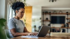 A woman trying to apply for a credit card online. 