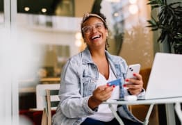 A woman learning about the benefits and drawbacks of online banking. 