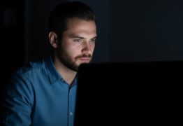 A man learning about the pros and cons of living benefits life insurance.
