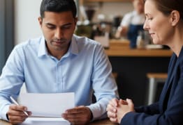 A man learning about DSCR and how it affects his business loan approval. 