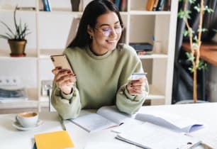 A young woman learning about building her credit history. 