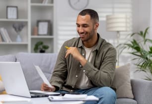 A man learning about reducing his taxable income in 2025. 