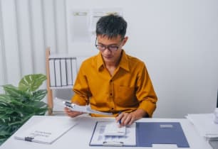 A man filing his income tax return. 