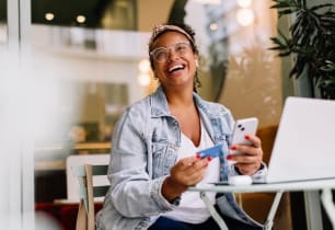 A woman learning about the benefits and drawbacks of online banking. 