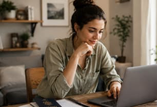 A woman considering a personal loan to borrow for her Summer travels.