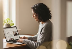 A woman learning all about high-risk business loans.