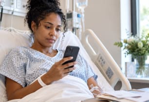 Person in the hospital thinking about who would manage their bills.