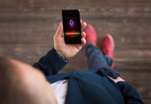 An image of a cellphone displaying AI