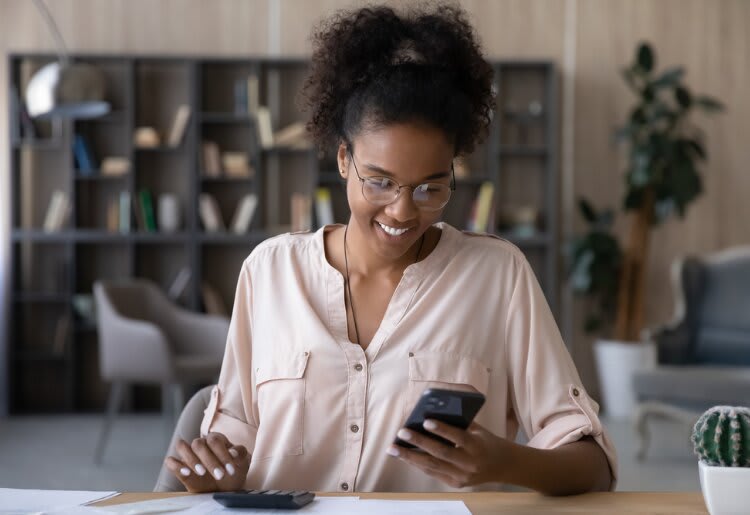 A woman learning about credit unions vs banks. 