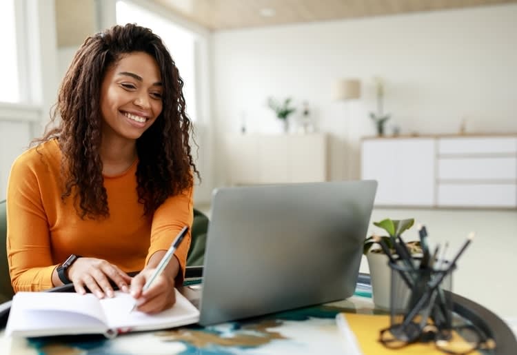 A first-time home buyer making a checklist. 