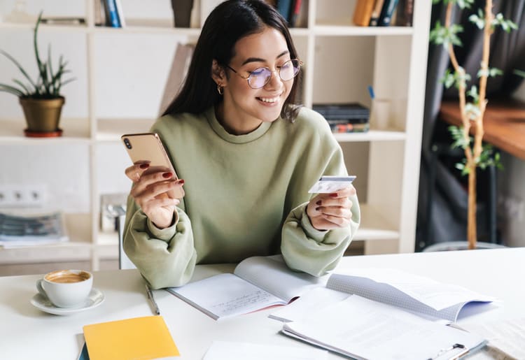 A young woman learning about building her credit history. 