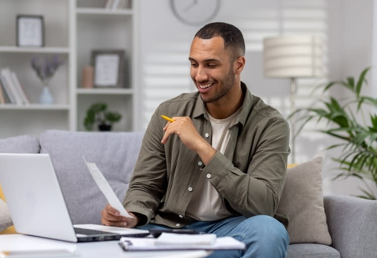 A man learning about reducing his taxable income in 2025. 