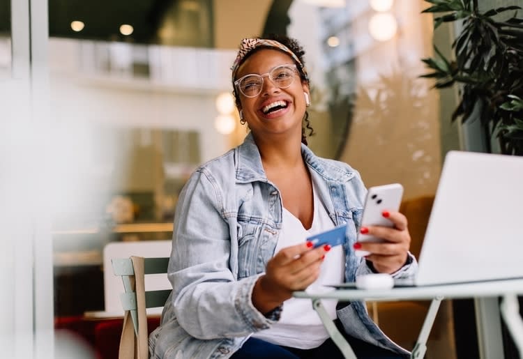 A woman learning about the benefits and drawbacks of online banking. 