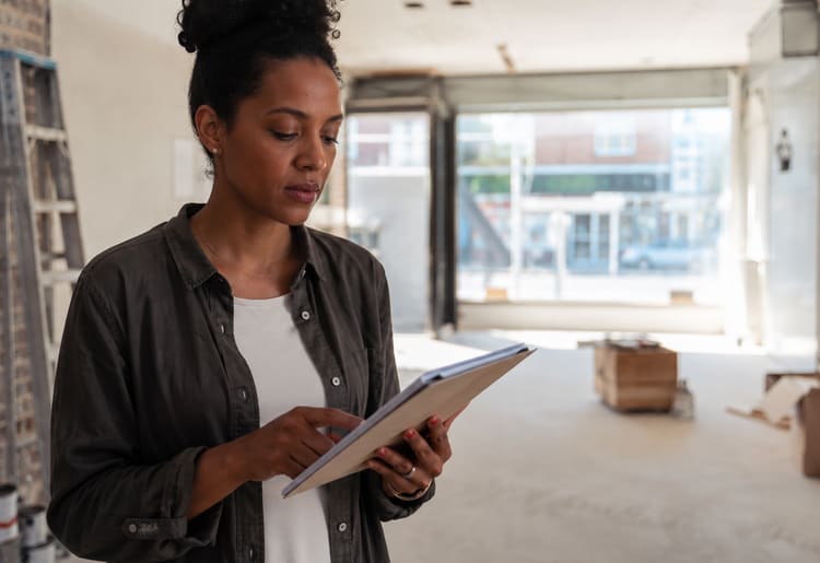 Entrepreneur planning startup costs for a new business.