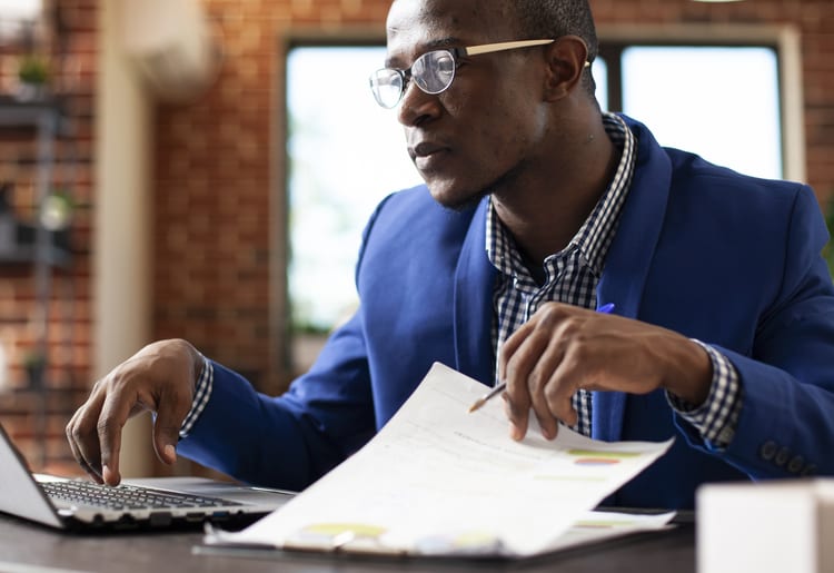 A small business owner trying to rebuild his business credit and improve his credit score.