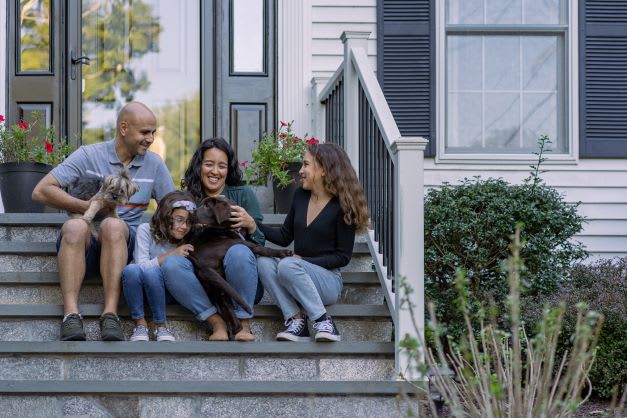 happy family on steps